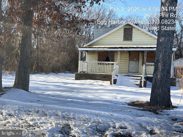 2607 Fire Road Egg Harbor Township, NJ 08234 - Photo 1 of 3 a front view of a house with a yard