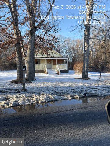 2607 Fire Road Egg Harbor Township, NJ 08234 - Photo 3 of 3 a view of a house with a yard