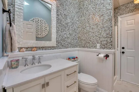 a bathroom with a sink and a toilet