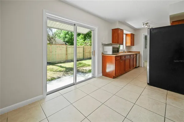 a kitchen with stainless steel appliances a refrigerator and sink