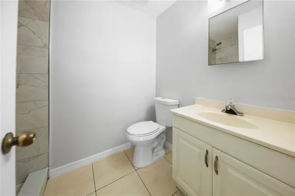 a bathroom with a sink and a toilet