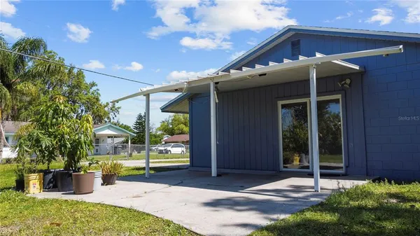 a view of a house with a garden