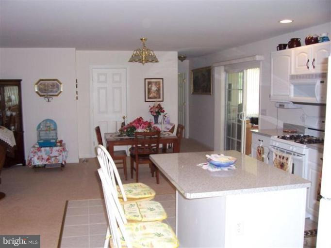 25813 Hunters Point Lane Denton, MD 21629 - Photo 5 of 5 a view of a dining room with furniture