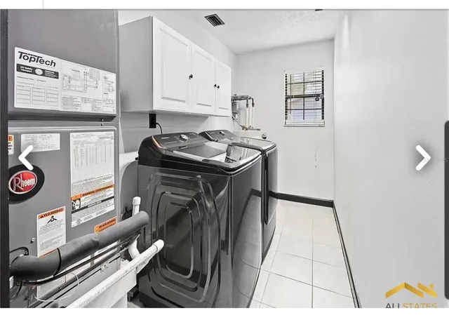 a view of a house with backyard and entertaining space