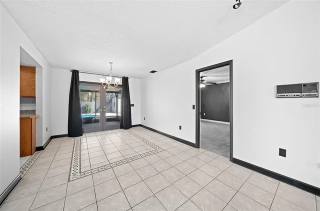 a kitchen with stainless steel appliances granite countertop a sink and a stove