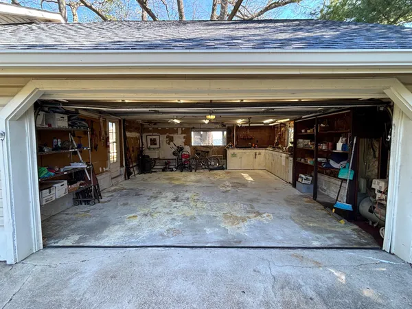 a view of a garage with chairs