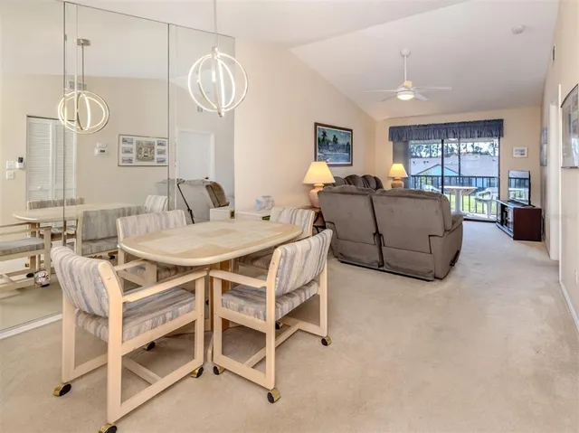 a kitchen with stainless steel appliances granite countertop a stove and a microwave