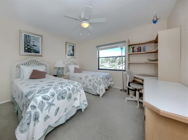 a kitchen with granite countertop a sink stainless steel appliances and cabinets