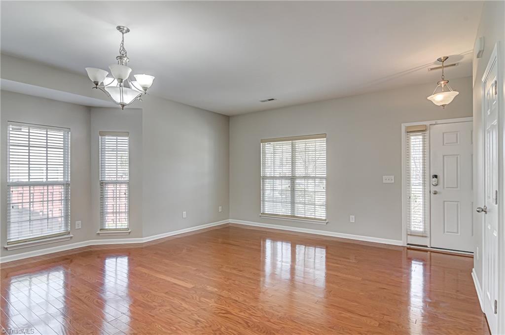 5421 Broadleaf Road Summerfield, NC 27358 - Photo 4 of 30 Hardwood floors grace the front room