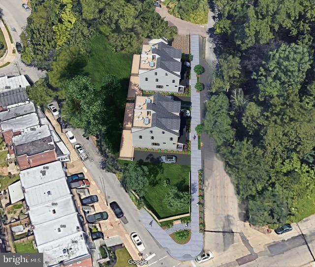 5977 Jannette Street Philadelphia, PA 19128 - Photo 2 of 2 an aerial view of a house with outdoor space