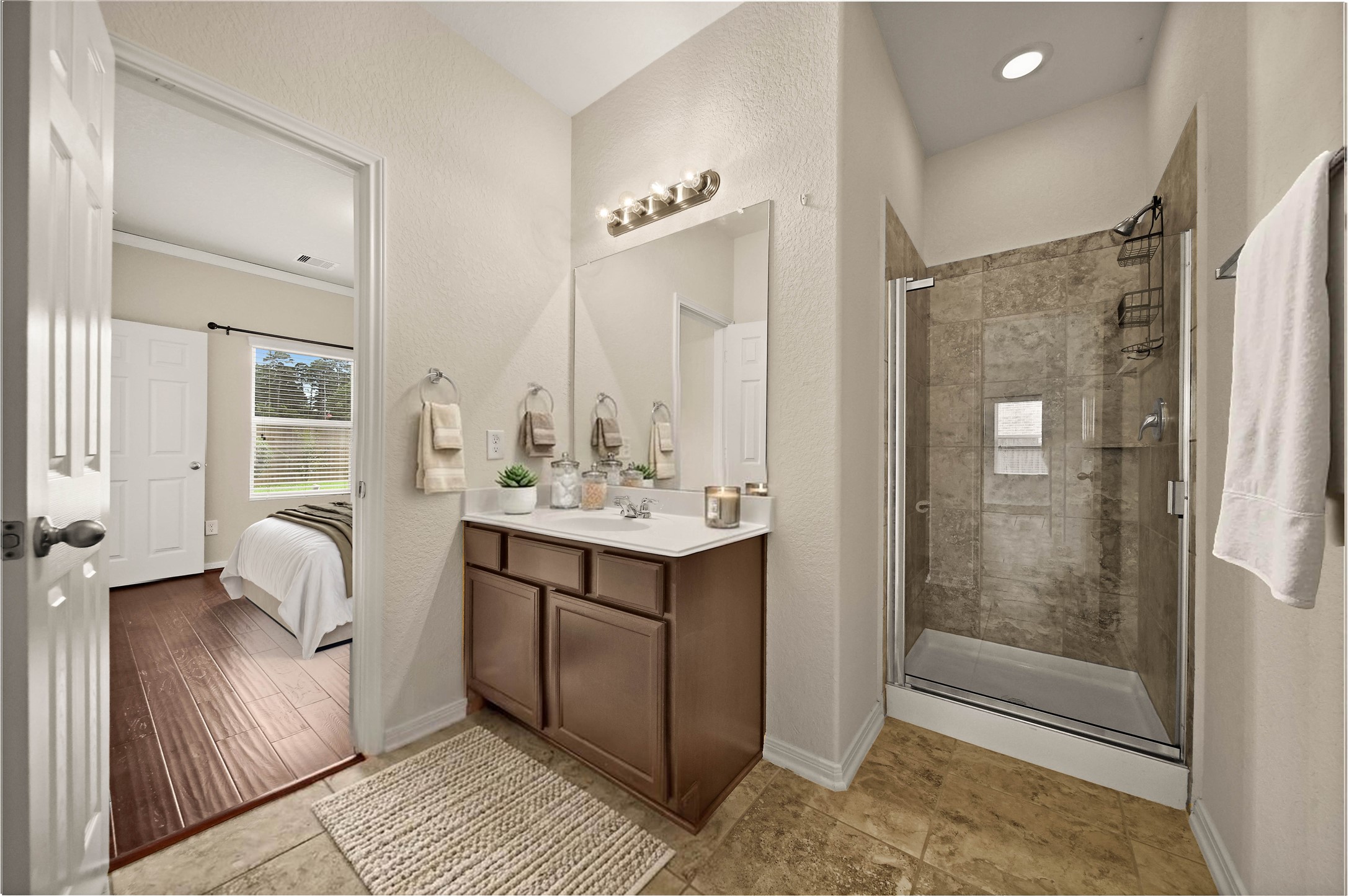 2672 Magnolia Fair Way Spring, TX 77386 - Photo 13 of 49 The first floor full bath boasts a walk-in shower that's ideal for when your in-laws are visiting.