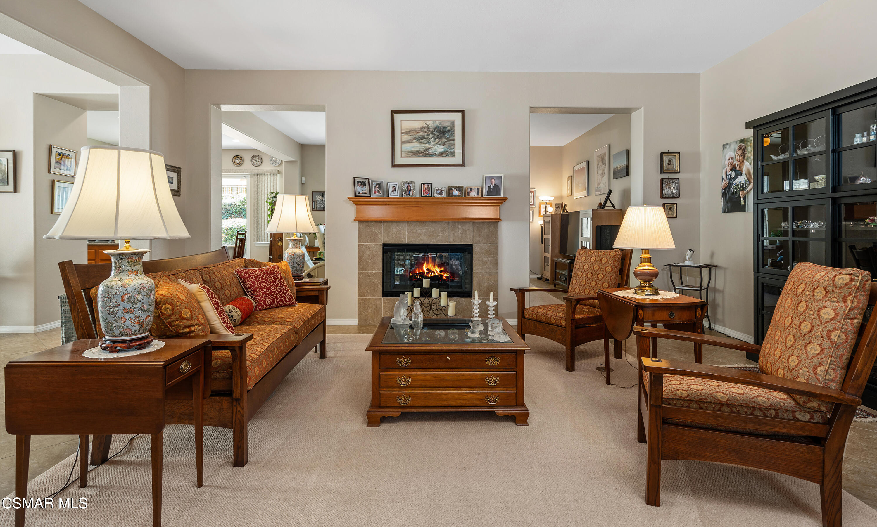 6835 Blue Ridge Way Moorpark, CA 93021 - Photo 3 of 39 a living room with furniture and a fireplace