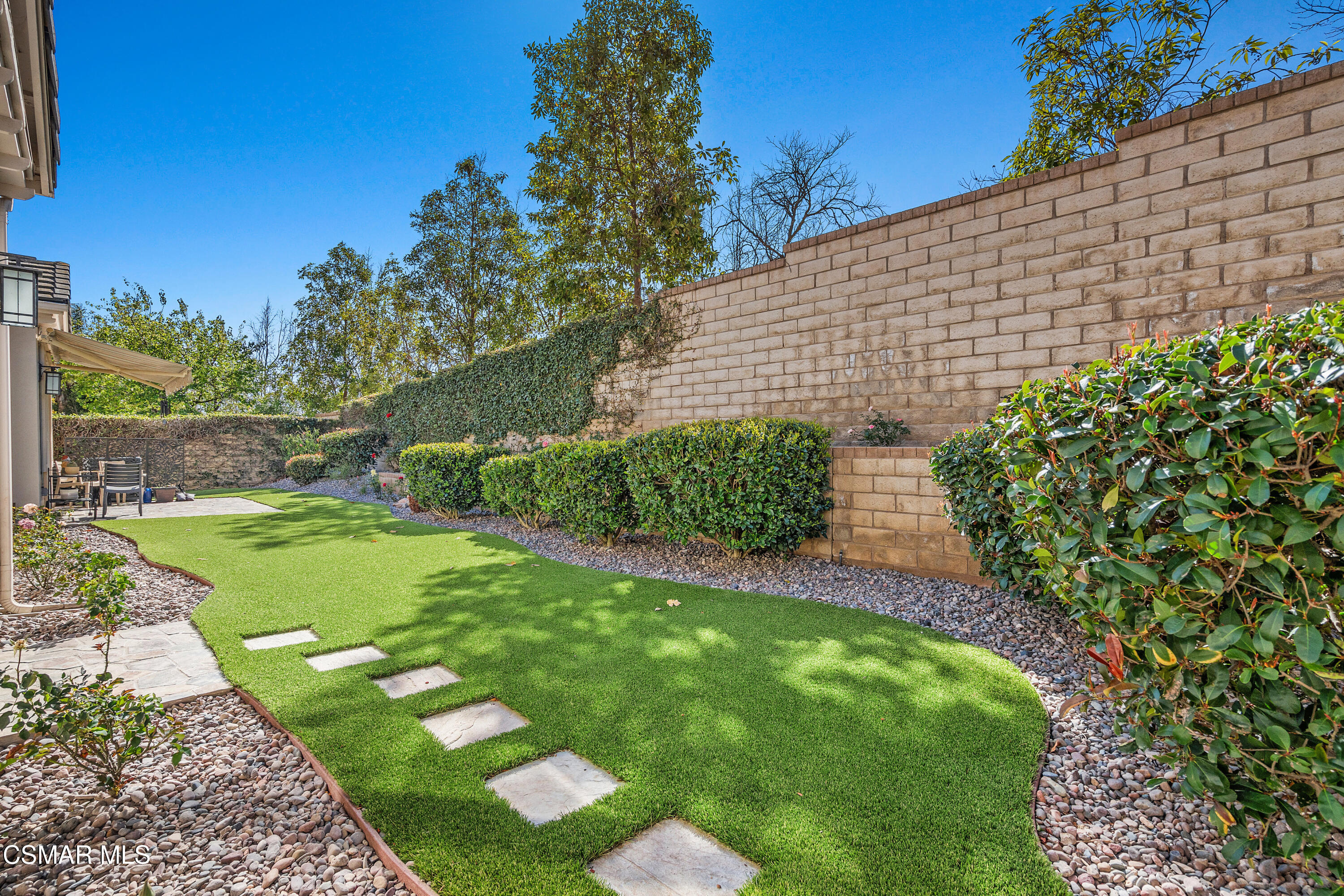 6835 Blue Ridge Way Moorpark, CA 93021 - Photo 32 of 39 a backyard with plants and large tree