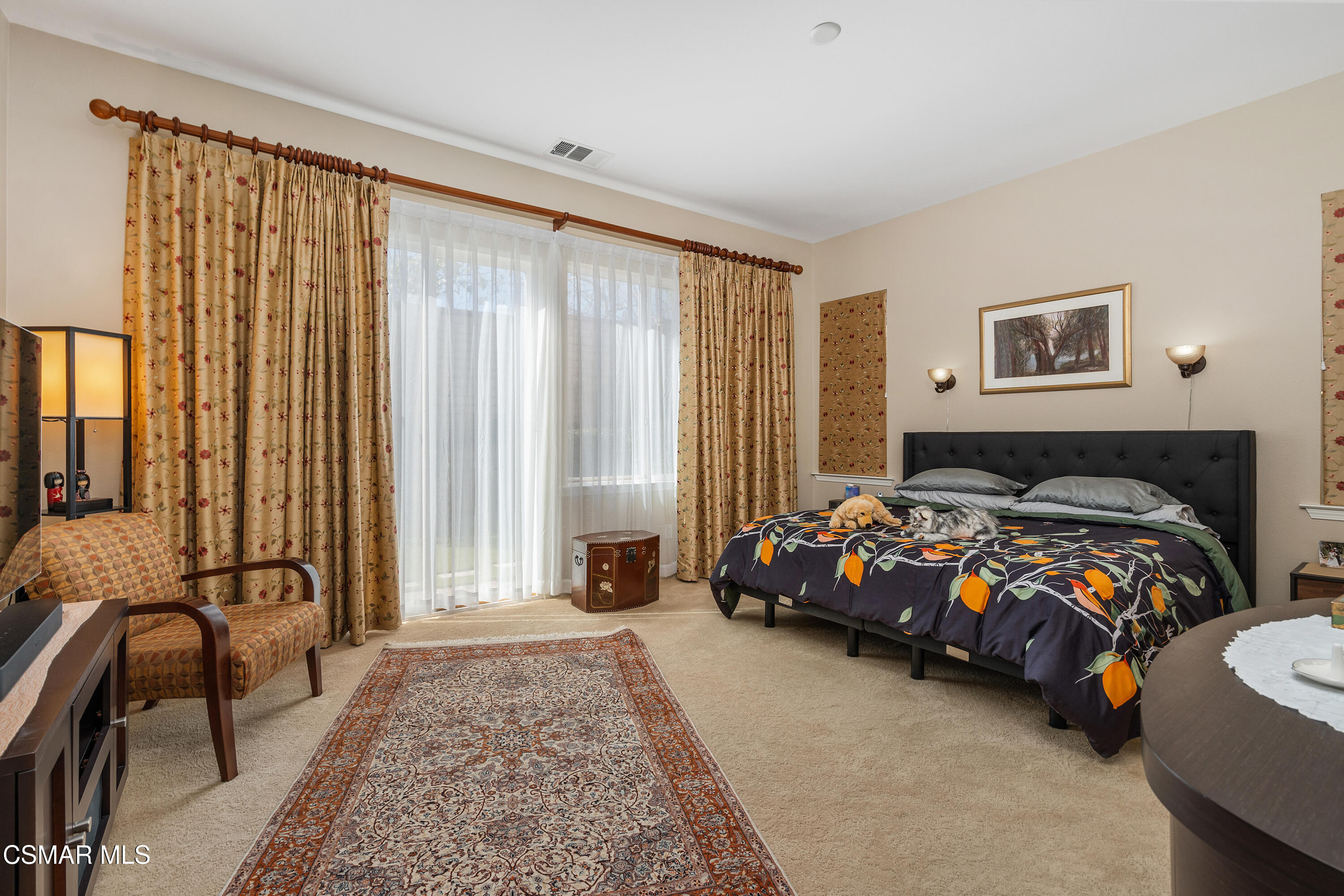 6835 Blue Ridge Way Moorpark, CA 93021 - Photo 8 of 39 a bedroom with a bed and a couch