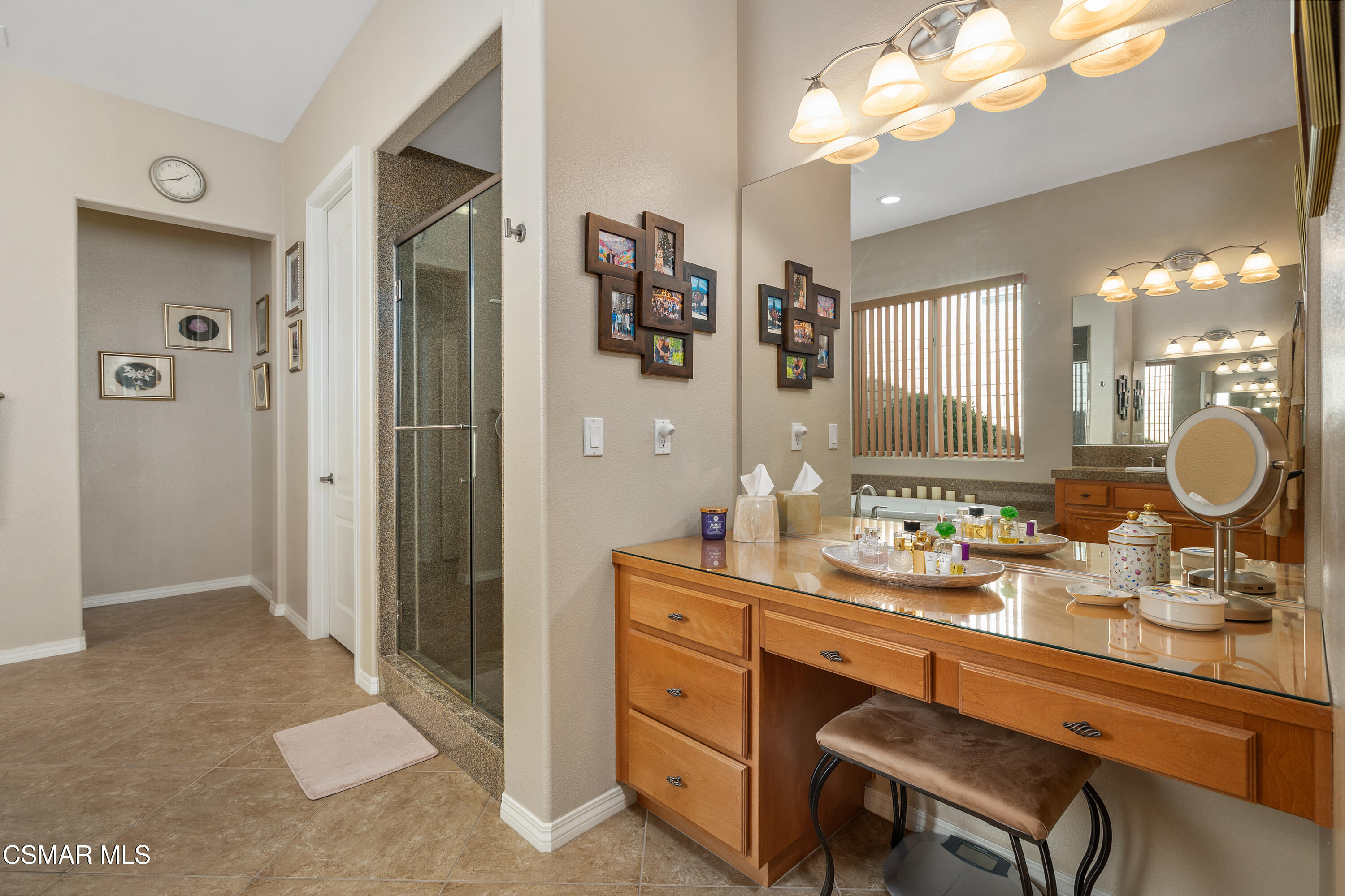 6835 Blue Ridge Way Moorpark, CA 93021 - Photo 10 of 39 a room with two sink and a mirror
