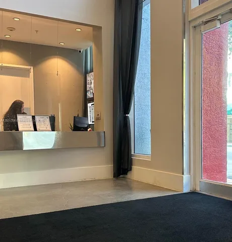 a view of a lobby with a potted plant