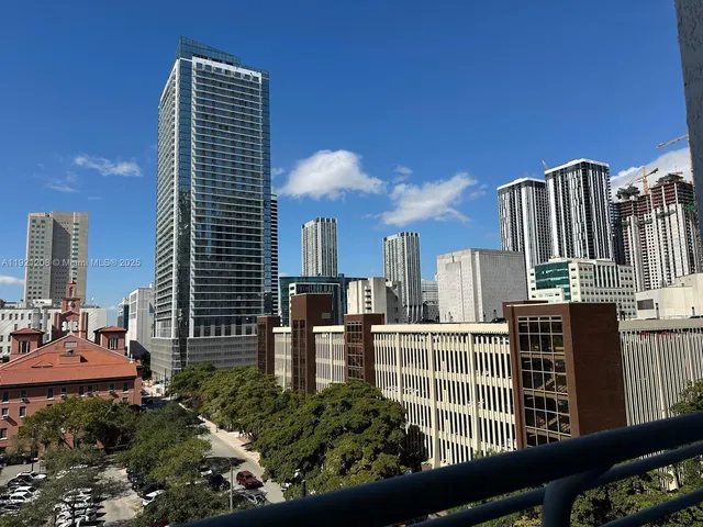 a view of a city with tall buildings