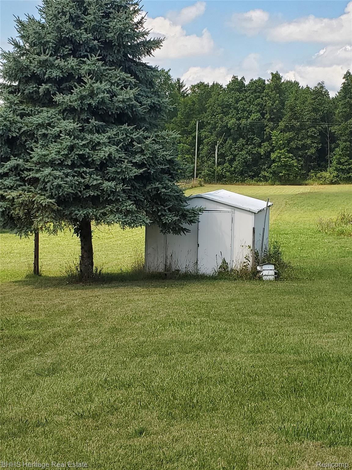 3126 Brophy Road Howell, MI 48855 - Photo 6 of 20 Shed by pond for storage