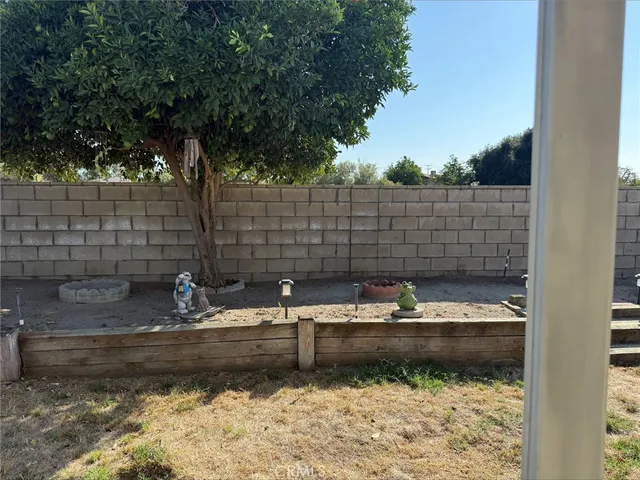 a view of swimming pool from a bathroom