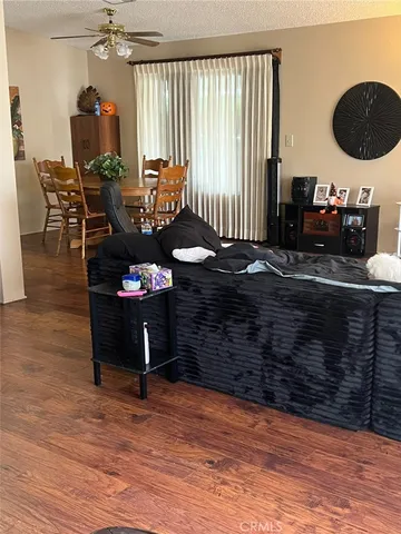 a room with furniture and wooden floor