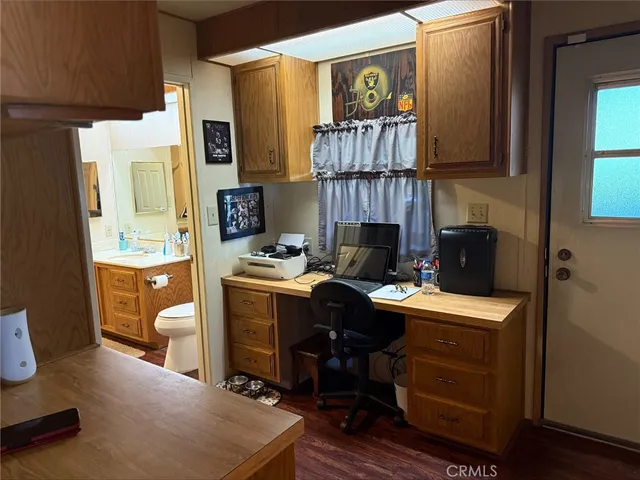 a room with furniture a fireplace and a window