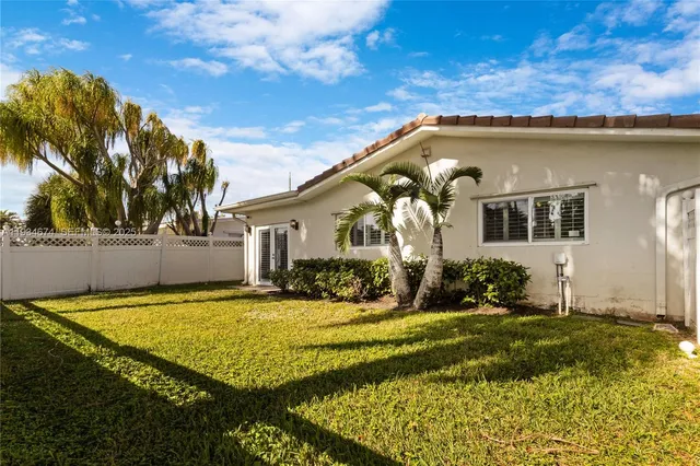 a view of a house with a swimming pool