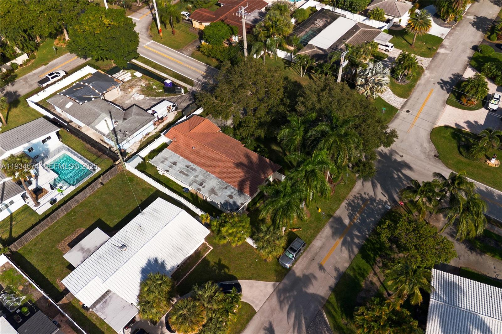 3401 Northeast 21st Avenue Lighthouse Point, FL 33064 - Photo 37 of 38 an aerial view of a house with a yard