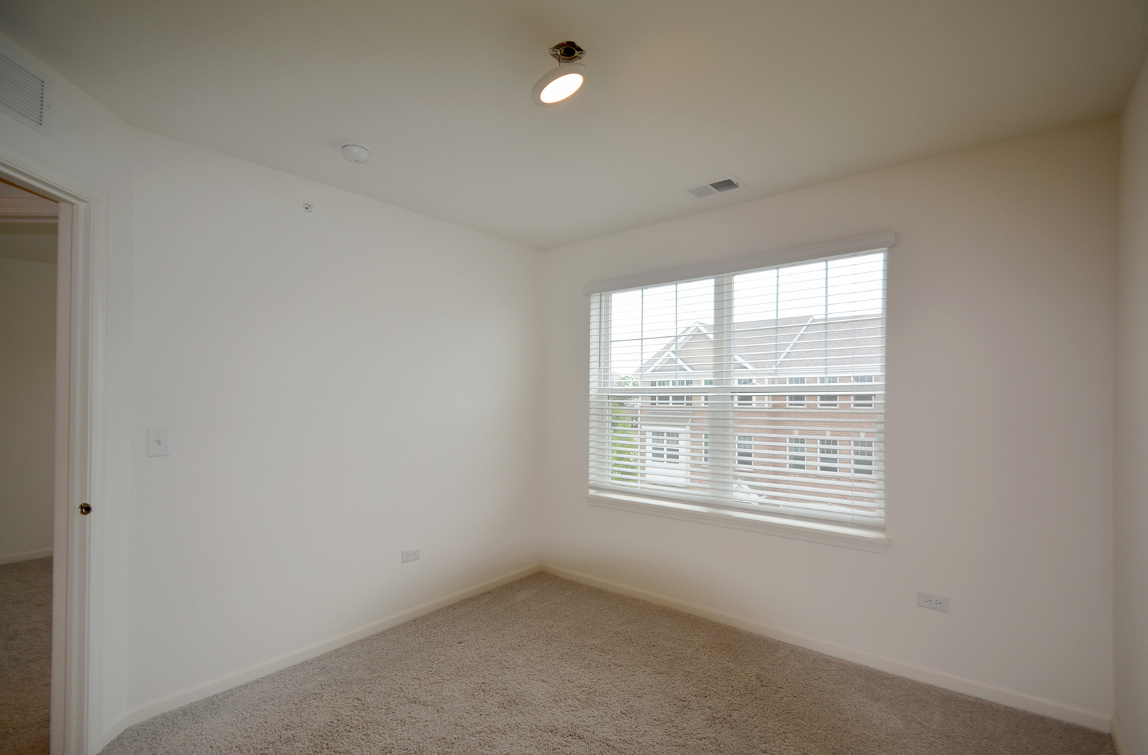 17 Grey Wolf Drive Wheeling, IL 60090 - Photo 17 of 25 an empty room with a window
