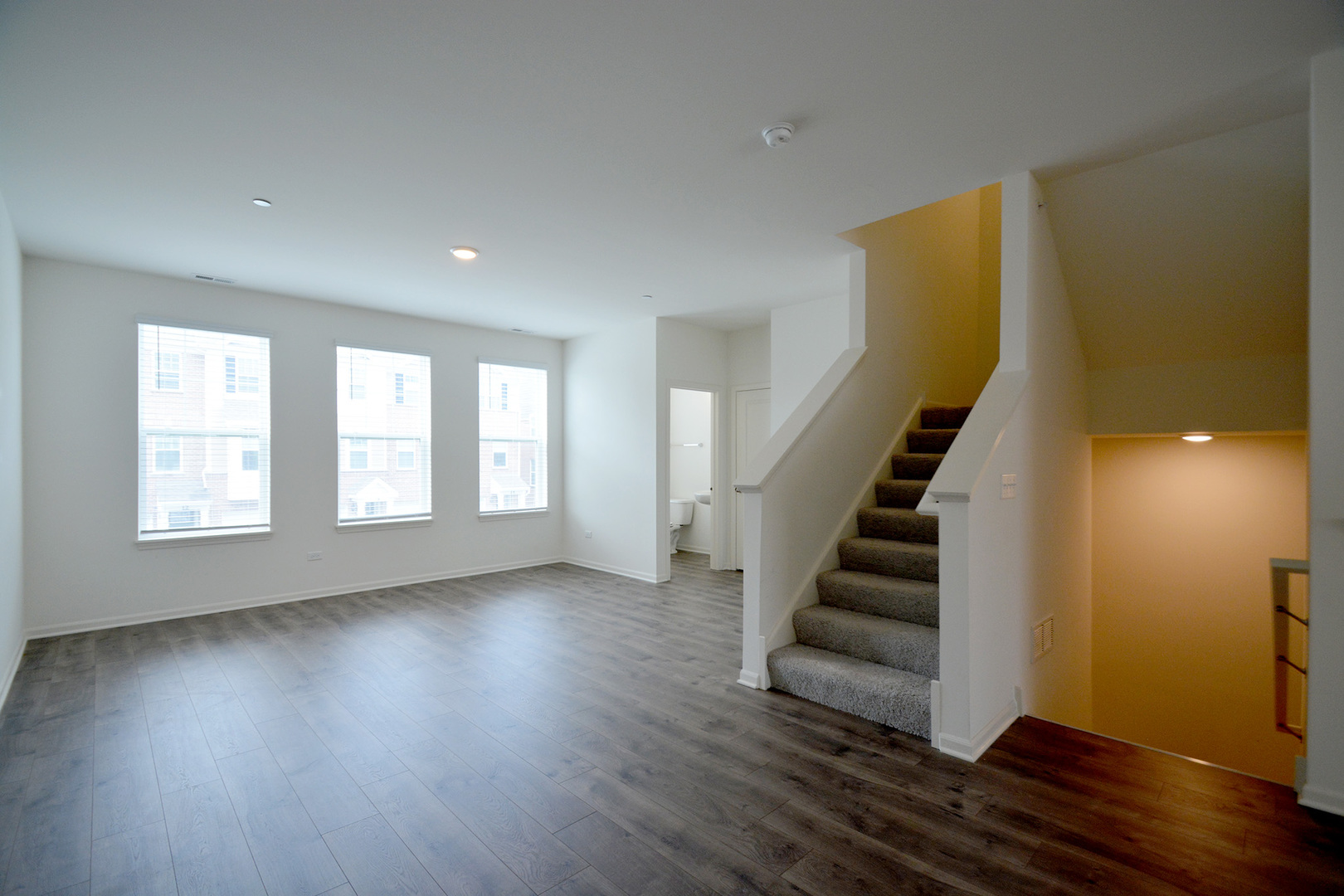 17 Grey Wolf Drive Wheeling, IL 60090 - Photo 8 of 25 wooden floor in an empty room with a window