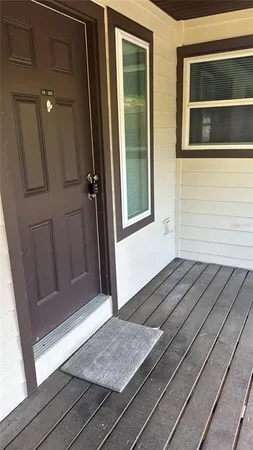 an empty room and entryway