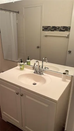 a view of a utility room with closet