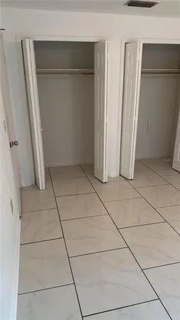 a bathroom with a toilet and a bathtub