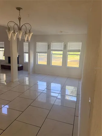 a kitchen with a stove a sink and a refrigerator