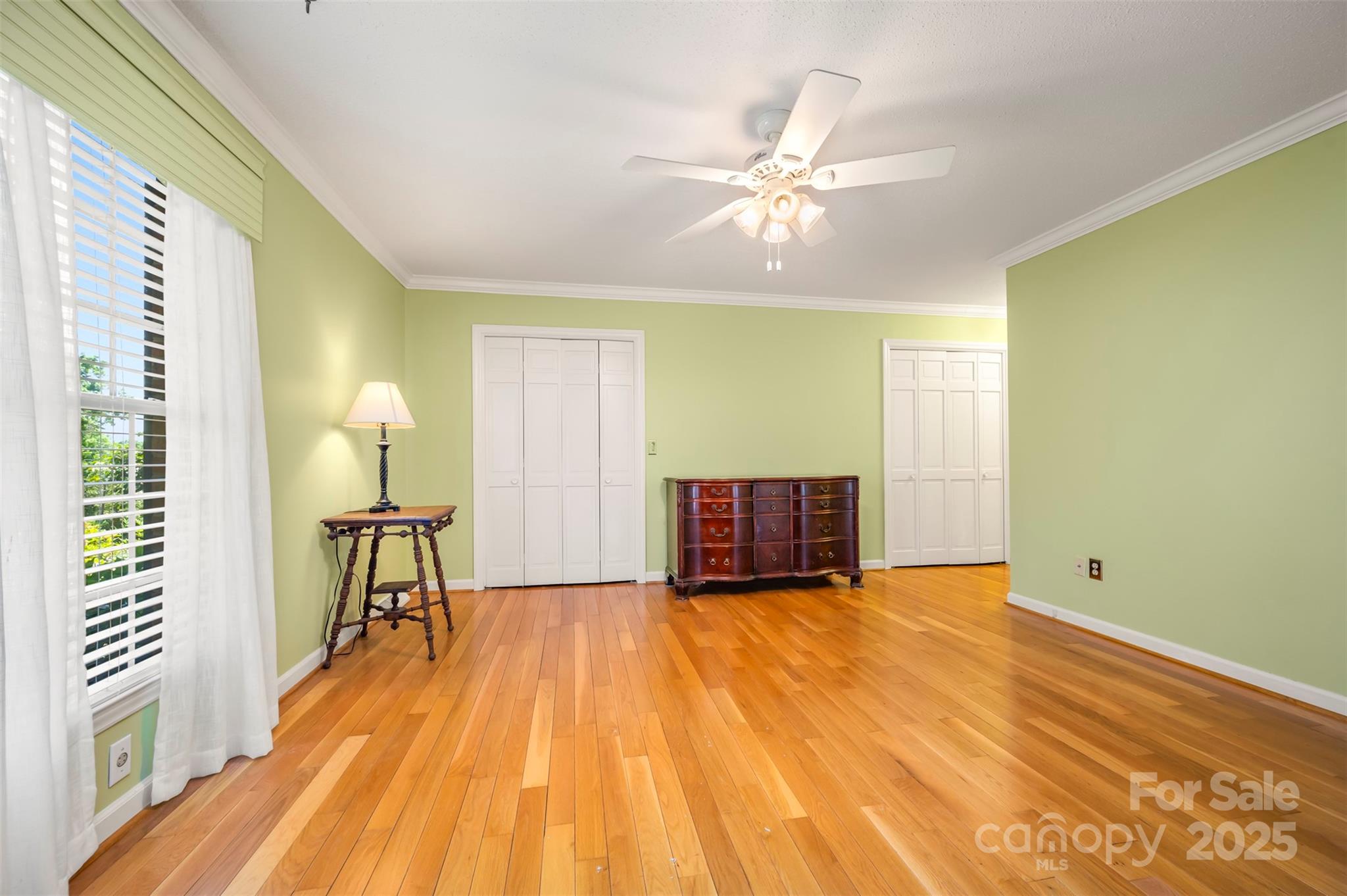 147 Anne Street Rutherfordton, NC 28139 - Photo 18 of 31 a view of an empty room with wooden floor and a window