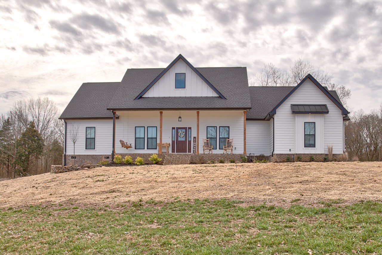 1190 Greenvale Road Milton, TN 37118 - Photo 1 of 21 a front view of a house with a yard