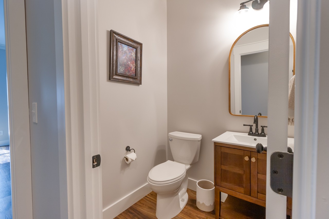 1190 Greenvale Road Milton, TN 37118 - Photo 13 of 21 a bathroom with a toilet sink and mirror