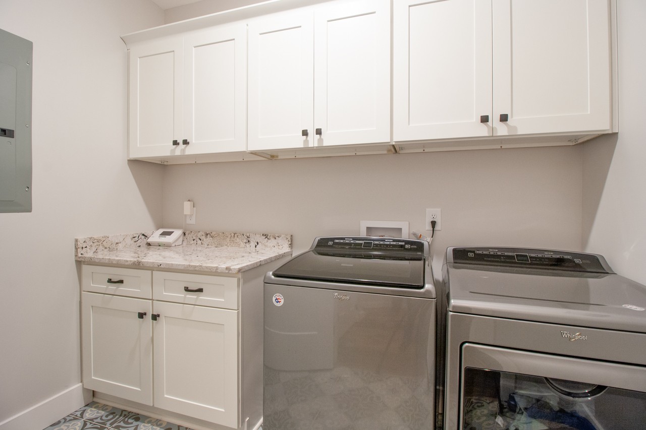 1190 Greenvale Road Milton, TN 37118 - Photo 15 of 21 a kitchen with granite countertop white cabinets and a stove