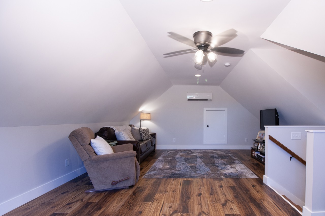 1190 Greenvale Road Milton, TN 37118 - Photo 16 of 21 a living room with furniture and a chandelier
