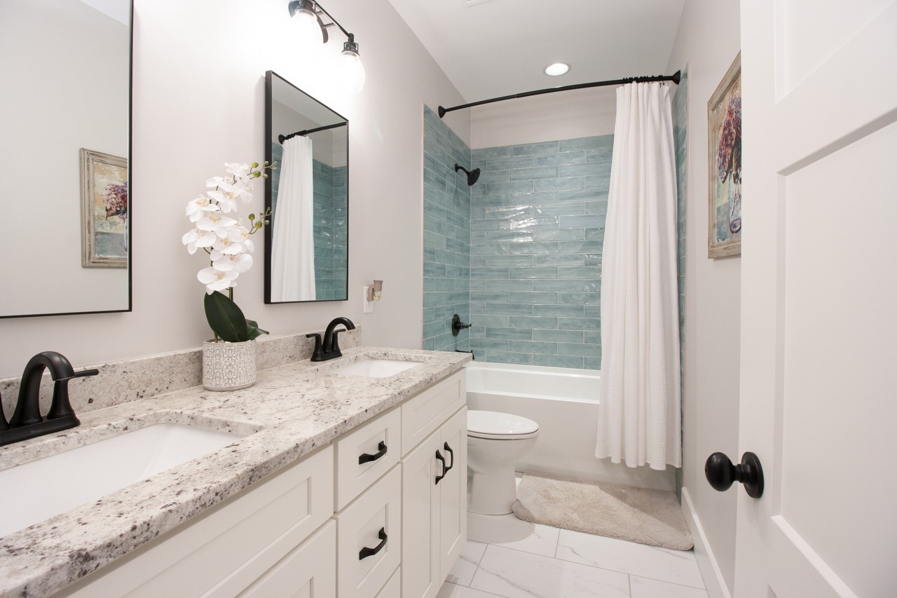 1190 Greenvale Road Milton, TN 37118 - Photo 8 of 21 a bathroom with a granite countertop sink toilet and shower