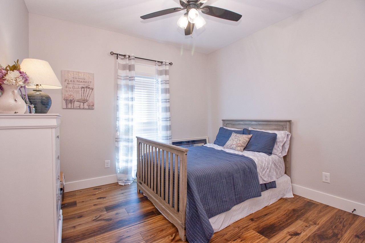 1190 Greenvale Road Milton, TN 37118 - Photo 10 of 21 a bedroom with a bed and wooden floor