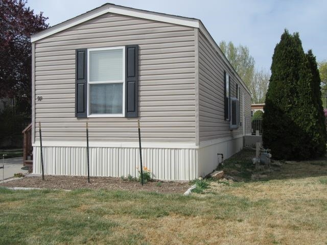 3251 E Road, Unit 99 Clifton, CO 81520 - Photo 2 of 25 a front view of a house
