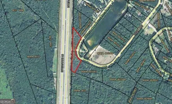 an aerial view of a highlighted house
