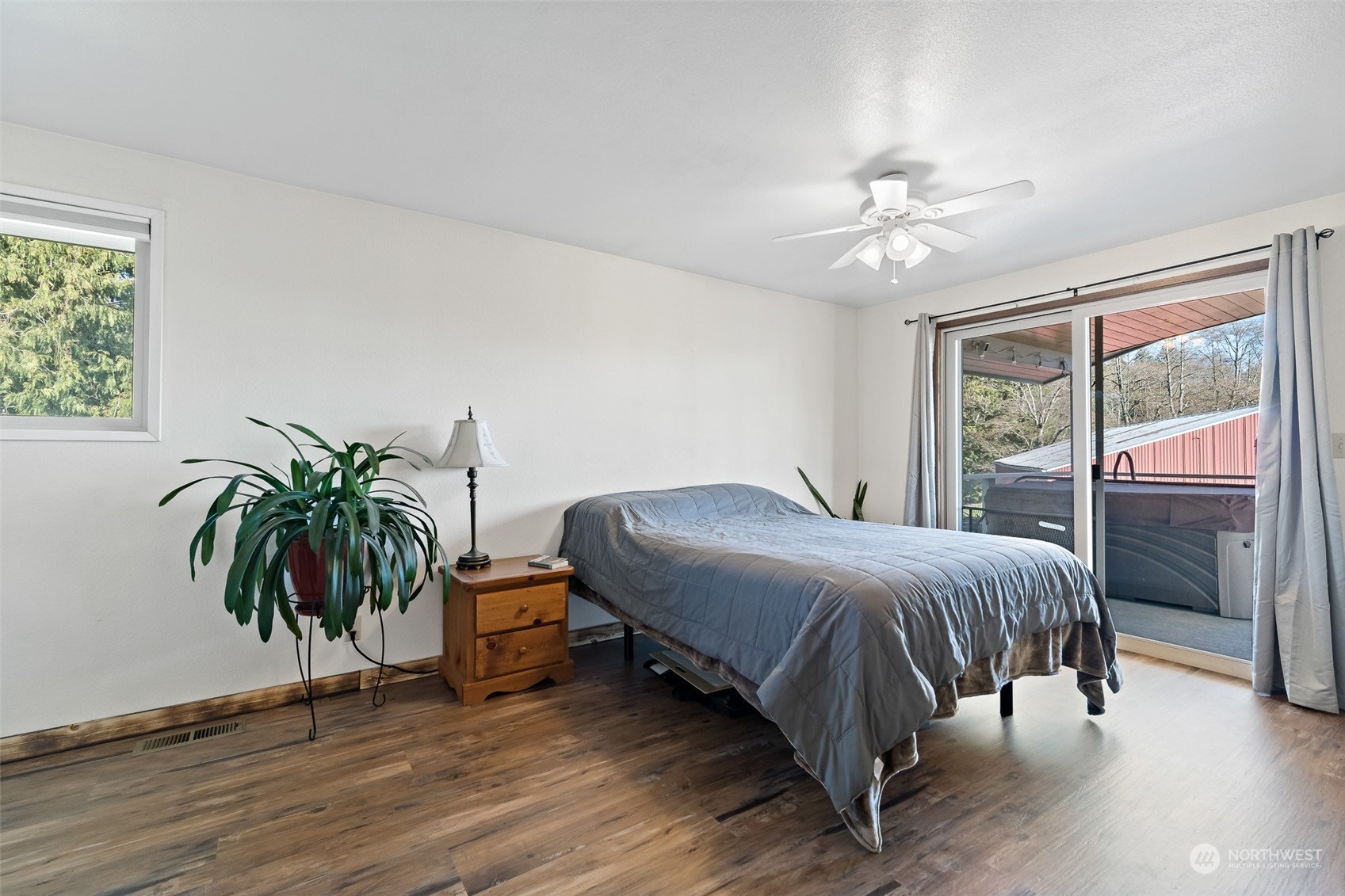 2180 Brown Road Ferndale, WA 98248 - Photo 15 of 40 a living room with a bed furniture and a large window