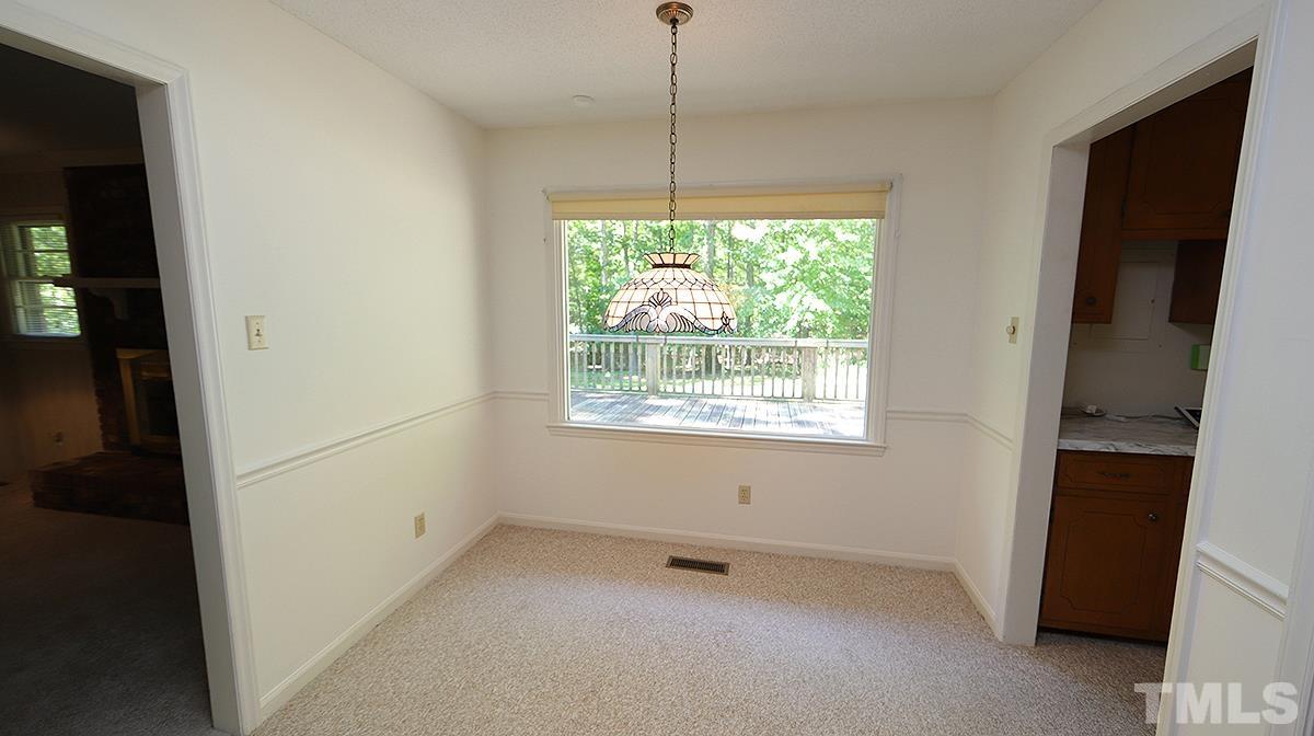 720 Torredge Road Durham, NC 27712 - Photo 8 of 17 a view of a room with window