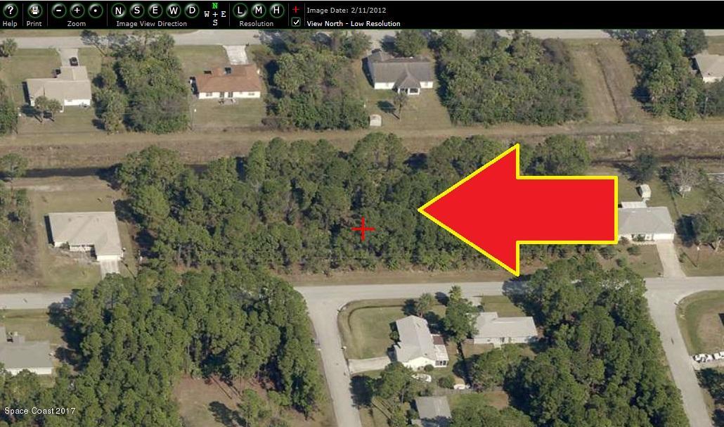 811 Geary Street Southwest Palm Bay, FL 32908 - Photo 1 of 5 an aerial view of residential house with outdoor space