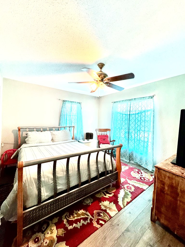 212 Way Drive Ingram, TX 78025 - Photo 16 of 22 a view of a living room and a balcony