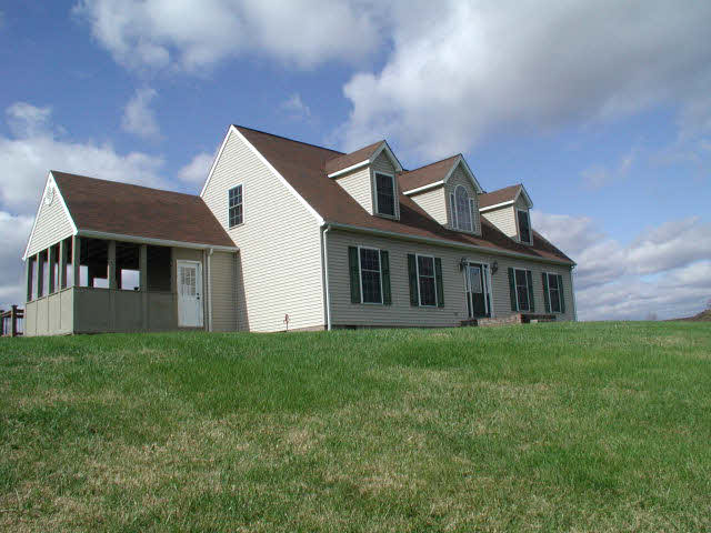82 Millers Road Bridgewater, VA 22812 - Photo 1 of 1 a front view of house with yard and green space