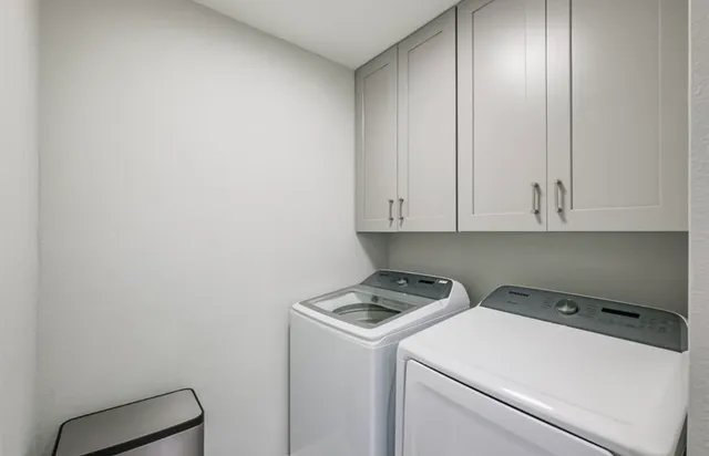 a dining room with a table and chairs