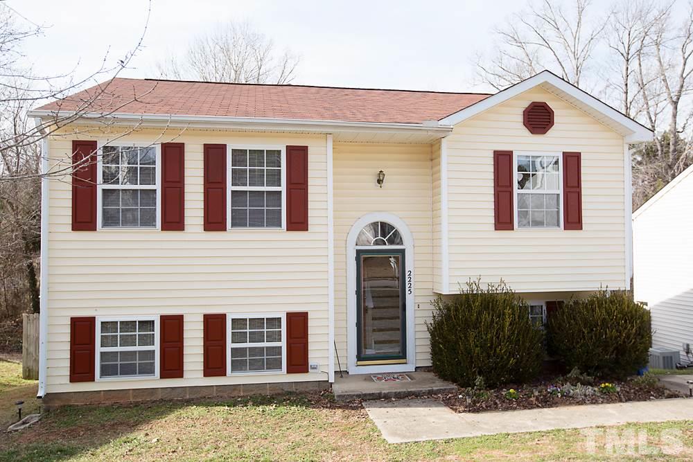 2225 Springhill Avenue Raleigh, NC 27603 - Photo 1 of 18 a front view of a house with garden