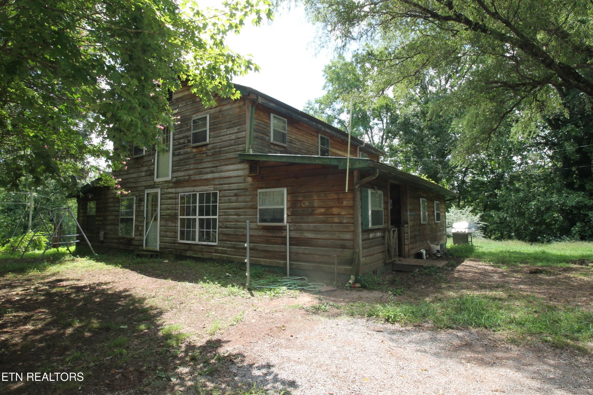 541 Wiggins Road Tellico Plains, TN 37385 - Photo 10 of 33 a view of a house with a yard